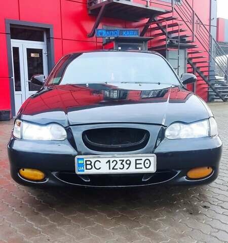 Черный Хендай Соната, объемом двигателя 2 л и пробегом 200 тыс. км за 1450 $, фото 6 на Automoto.ua