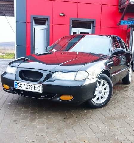 Черный Хендай Соната, объемом двигателя 2 л и пробегом 200 тыс. км за 1350 $, фото 4 на Automoto.ua