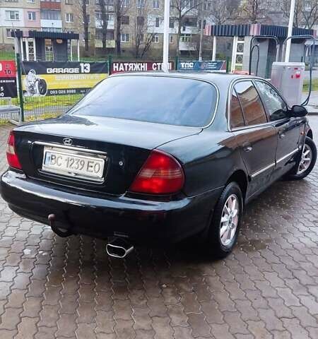 Черный Хендай Соната, объемом двигателя 2 л и пробегом 200 тыс. км за 1450 $, фото 9 на Automoto.ua