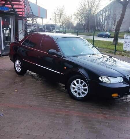 Черный Хендай Соната, объемом двигателя 2 л и пробегом 200 тыс. км за 1350 $, фото 9 на Automoto.ua