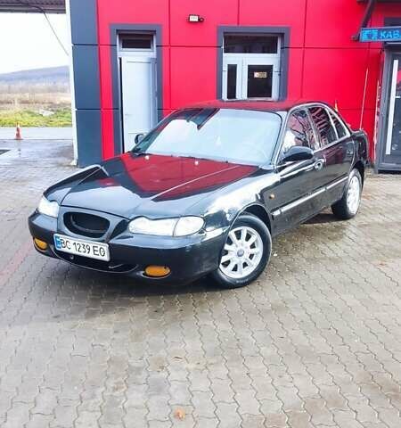 Черный Хендай Соната, объемом двигателя 2 л и пробегом 200 тыс. км за 1350 $, фото 2 на Automoto.ua