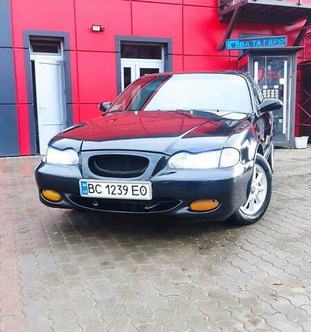 Черный Хендай Соната, объемом двигателя 2 л и пробегом 200 тыс. км за 1450 $, фото 2 на Automoto.ua