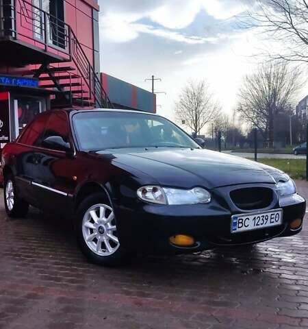 Черный Хендай Соната, объемом двигателя 2 л и пробегом 200 тыс. км за 1450 $, фото 4 на Automoto.ua