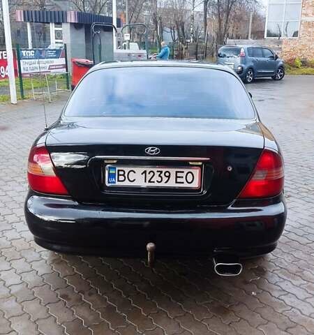 Черный Хендай Соната, объемом двигателя 2 л и пробегом 200 тыс. км за 1450 $, фото 7 на Automoto.ua