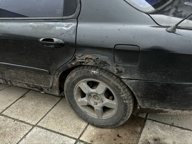 Черный Хендай Соната, объемом двигателя 2 л и пробегом 400 тыс. км за 1543 $, фото 5 на Automoto.ua