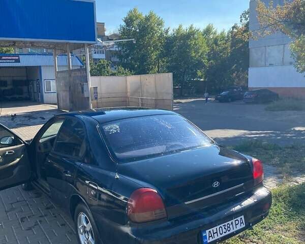 Черный Хендай Соната, объемом двигателя 2 л и пробегом 170 тыс. км за 2700 $, фото 6 на Automoto.ua