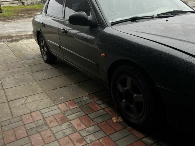 Черный Хендай Соната, объемом двигателя 2 л и пробегом 400 тыс. км за 1543 $, фото 3 на Automoto.ua