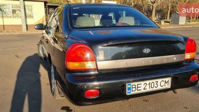 Черный Хендай Соната, объемом двигателя 2 л и пробегом 241 тыс. км за 2600 $, фото 4 на Automoto.ua