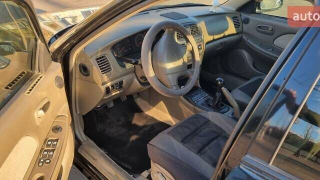 Черный Хендай Соната, объемом двигателя 2 л и пробегом 241 тыс. км за 2600 $, фото 7 на Automoto.ua