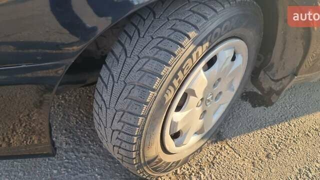 Черный Хендай Соната, объемом двигателя 2 л и пробегом 241 тыс. км за 2600 $, фото 12 на Automoto.ua