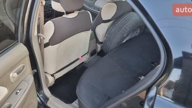 Черный Хендай Соната, объемом двигателя 2 л и пробегом 241 тыс. км за 2600 $, фото 9 на Automoto.ua