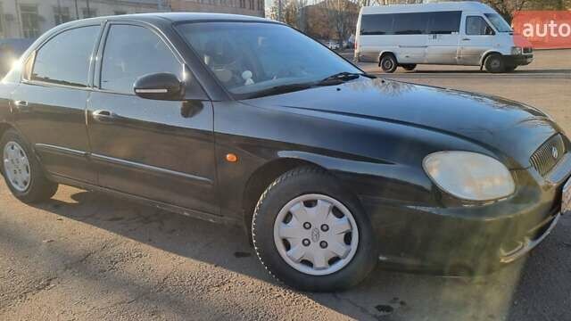 Черный Хендай Соната, объемом двигателя 2 л и пробегом 241 тыс. км за 2600 $, фото 1 на Automoto.ua