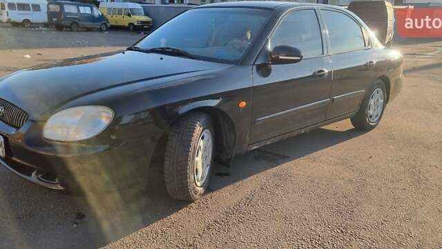 Черный Хендай Соната, объемом двигателя 2 л и пробегом 241 тыс. км за 2600 $, фото 5 на Automoto.ua