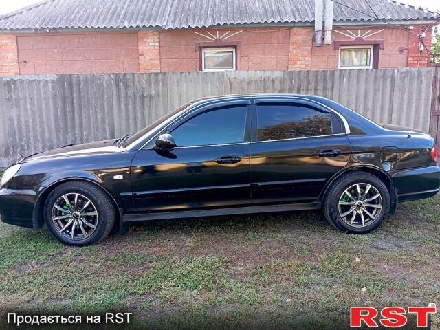 Черный Хендай Соната, объемом двигателя 2 л и пробегом 370 тыс. км за 4300 $, фото 2 на Automoto.ua