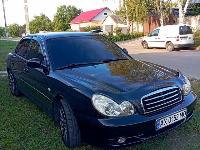 Черный Хендай Соната, объемом двигателя 2 л и пробегом 370 тыс. км за 4300 $, фото 3 на Automoto.ua
