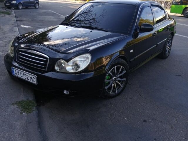 Черный Хендай Соната, объемом двигателя 2 л и пробегом 370 тыс. км за 4300 $, фото 8 на Automoto.ua