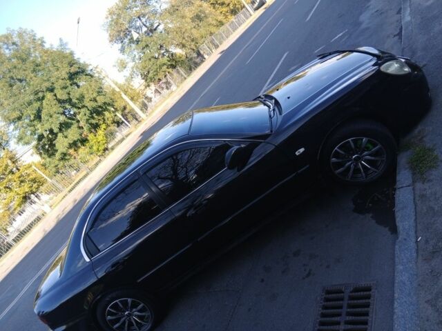 Черный Хендай Соната, объемом двигателя 2 л и пробегом 370 тыс. км за 4300 $, фото 9 на Automoto.ua