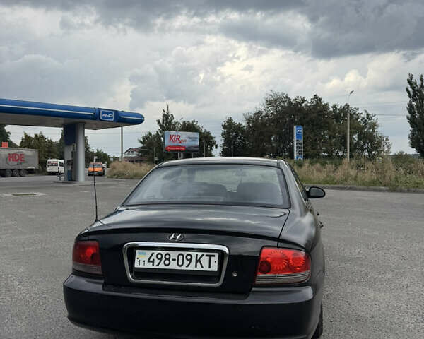 Черный Хендай Соната, объемом двигателя 2 л и пробегом 287 тыс. км за 2200 $, фото 6 на Automoto.ua