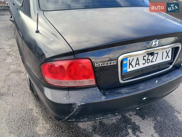 Черный Хендай Соната, объемом двигателя 2 л и пробегом 345 тыс. км за 2900 $, фото 5 на Automoto.ua