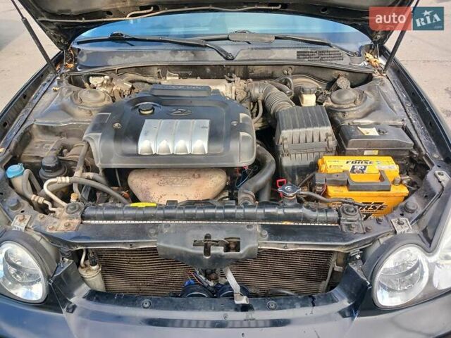 Черный Хендай Соната, объемом двигателя 2 л и пробегом 345 тыс. км за 2900 $, фото 15 на Automoto.ua