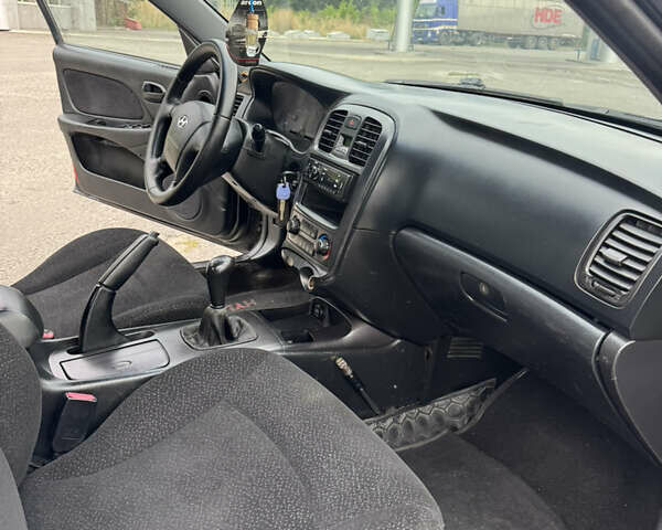 Черный Хендай Соната, объемом двигателя 2 л и пробегом 287 тыс. км за 2200 $, фото 14 на Automoto.ua