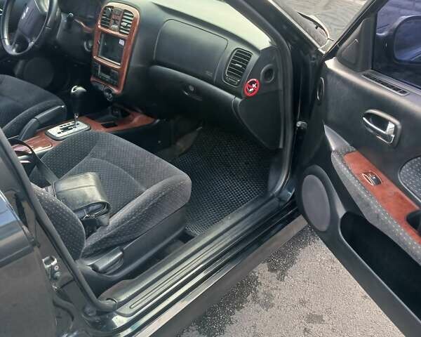 Черный Хендай Соната, объемом двигателя 2 л и пробегом 345 тыс. км за 2900 $, фото 31 на Automoto.ua