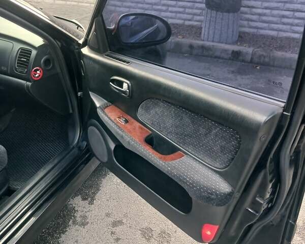 Черный Хендай Соната, объемом двигателя 2 л и пробегом 345 тыс. км за 2900 $, фото 32 на Automoto.ua