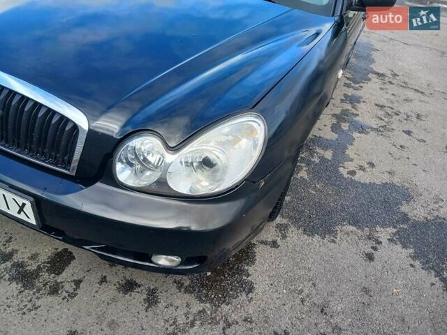 Черный Хендай Соната, объемом двигателя 2 л и пробегом 345 тыс. км за 2900 $, фото 11 на Automoto.ua