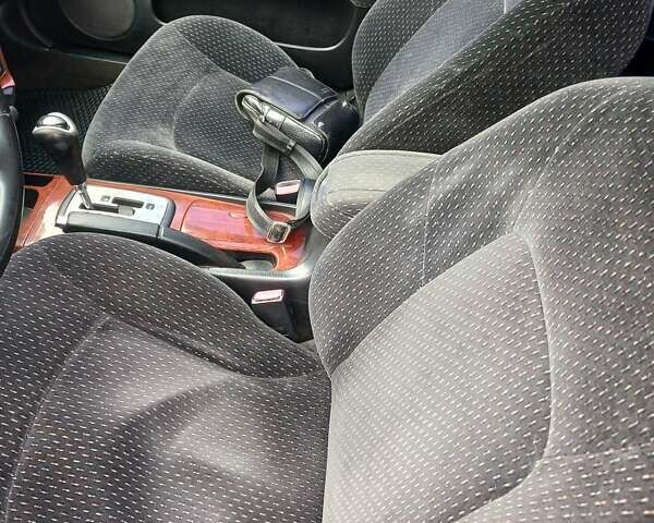 Черный Хендай Соната, объемом двигателя 2 л и пробегом 345 тыс. км за 2900 $, фото 22 на Automoto.ua