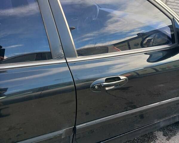 Черный Хендай Соната, объемом двигателя 2 л и пробегом 345 тыс. км за 2900 $, фото 2 на Automoto.ua