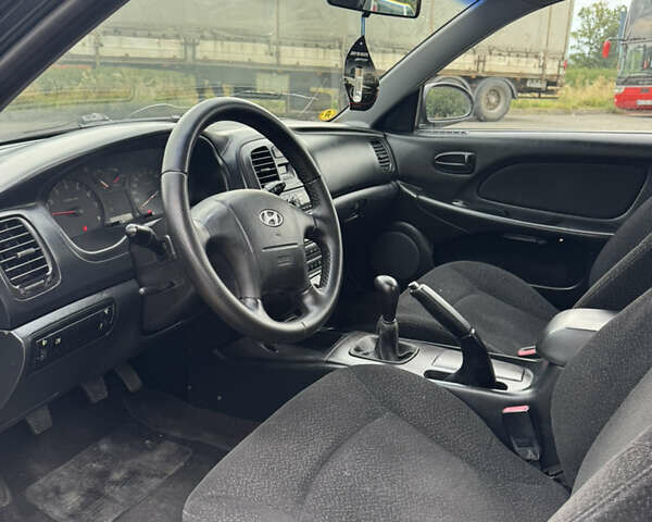 Черный Хендай Соната, объемом двигателя 2 л и пробегом 287 тыс. км за 2200 $, фото 9 на Automoto.ua