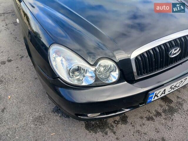 Черный Хендай Соната, объемом двигателя 2 л и пробегом 345 тыс. км за 2900 $, фото 12 на Automoto.ua