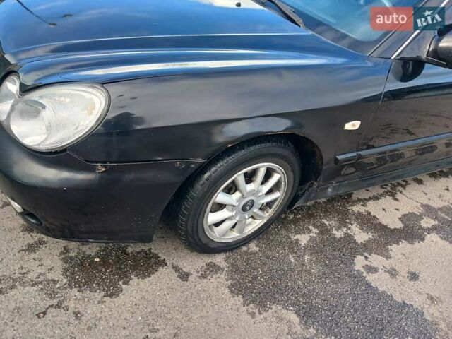 Черный Хендай Соната, объемом двигателя 2 л и пробегом 345 тыс. км за 2900 $, фото 10 на Automoto.ua