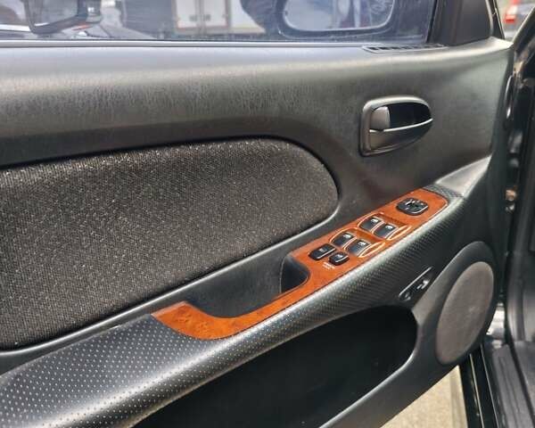 Черный Хендай Соната, объемом двигателя 2 л и пробегом 307 тыс. км за 2850 $, фото 12 на Automoto.ua