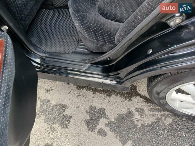 Черный Хендай Соната, объемом двигателя 2 л и пробегом 345 тыс. км за 2900 $, фото 19 на Automoto.ua