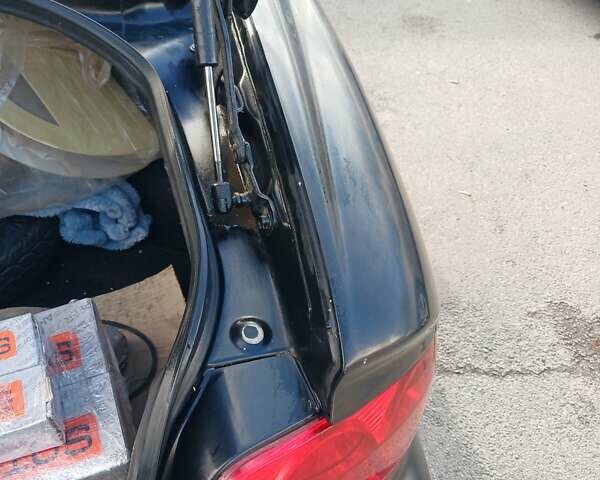 Черный Хендай Соната, объемом двигателя 2 л и пробегом 345 тыс. км за 2900 $, фото 26 на Automoto.ua