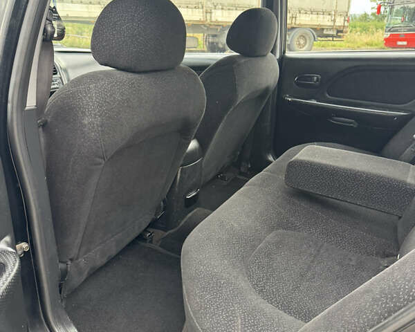 Черный Хендай Соната, объемом двигателя 2 л и пробегом 287 тыс. км за 2200 $, фото 11 на Automoto.ua