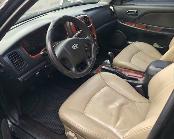 Черный Хендай Соната, объемом двигателя 2 л и пробегом 307 тыс. км за 2850 $, фото 2 на Automoto.ua