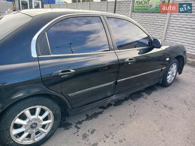Черный Хендай Соната, объемом двигателя 2 л и пробегом 345 тыс. км за 2900 $, фото 3 на Automoto.ua
