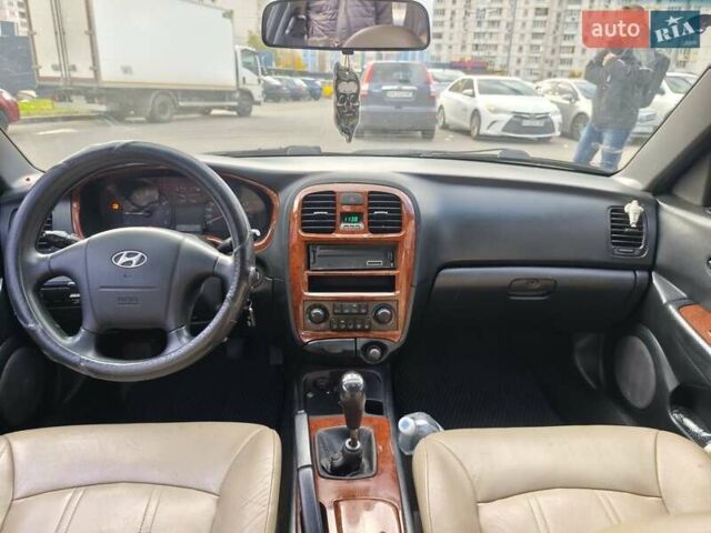 Черный Хендай Соната, объемом двигателя 2 л и пробегом 307 тыс. км за 2850 $, фото 14 на Automoto.ua