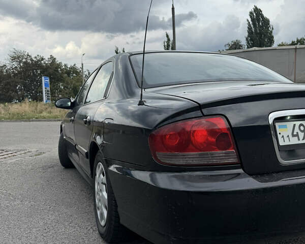 Черный Хендай Соната, объемом двигателя 2 л и пробегом 287 тыс. км за 2200 $, фото 7 на Automoto.ua