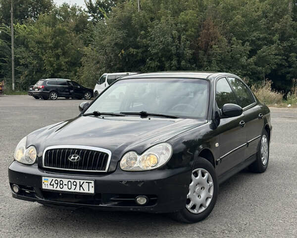 Черный Хендай Соната, объемом двигателя 2 л и пробегом 287 тыс. км за 2200 $, фото 1 на Automoto.ua