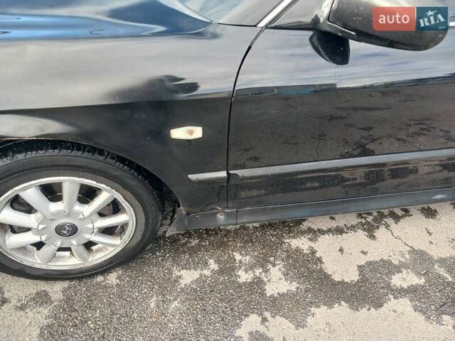 Черный Хендай Соната, объемом двигателя 2 л и пробегом 345 тыс. км за 2900 $, фото 9 на Automoto.ua