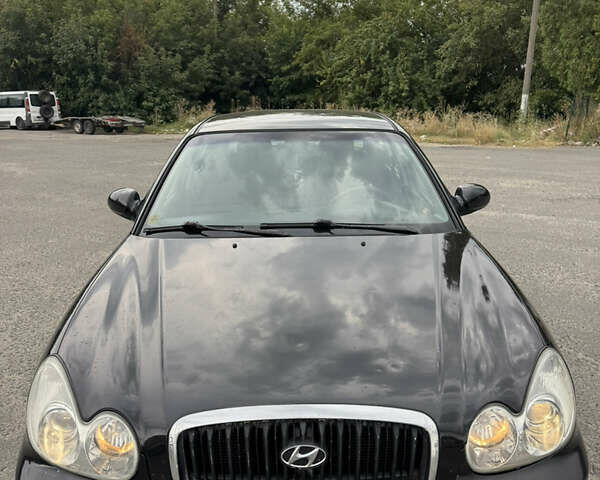 Черный Хендай Соната, объемом двигателя 2 л и пробегом 287 тыс. км за 2200 $, фото 5 на Automoto.ua