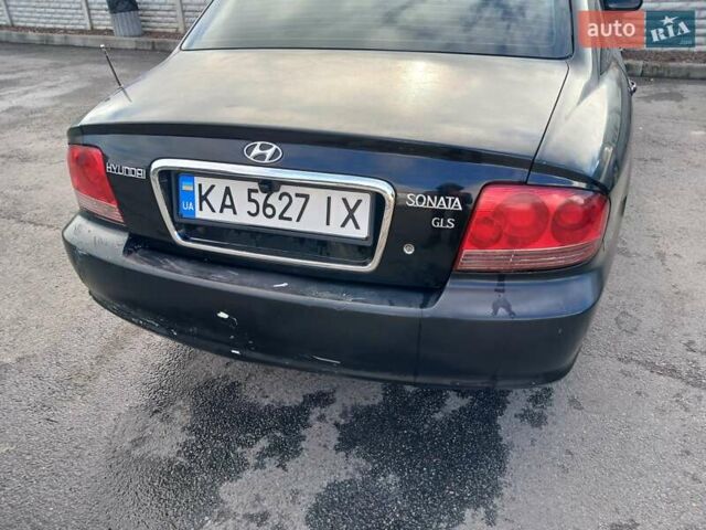 Черный Хендай Соната, объемом двигателя 2 л и пробегом 345 тыс. км за 2900 $, фото 6 на Automoto.ua