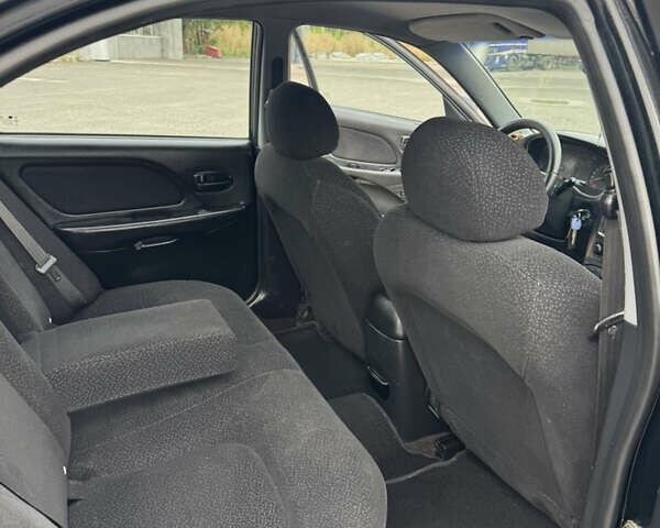 Черный Хендай Соната, объемом двигателя 2 л и пробегом 287 тыс. км за 2200 $, фото 13 на Automoto.ua