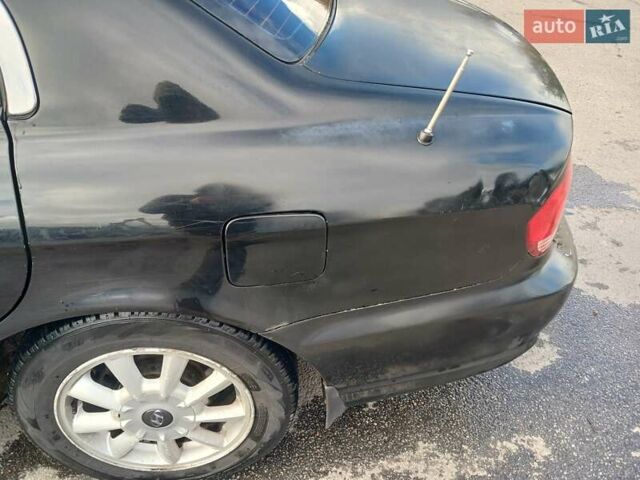 Черный Хендай Соната, объемом двигателя 2 л и пробегом 345 тыс. км за 2900 $, фото 8 на Automoto.ua