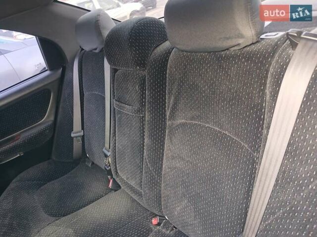 Черный Хендай Соната, объемом двигателя 2 л и пробегом 345 тыс. км за 2900 $, фото 17 на Automoto.ua