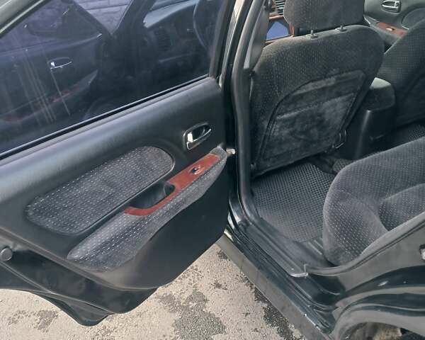 Черный Хендай Соната, объемом двигателя 2 л и пробегом 345 тыс. км за 2900 $, фото 21 на Automoto.ua