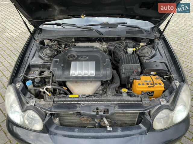 Хендай Соната 2004 в Львове на Automoto.ua Черный Хендай Соната, объемом двигателя 2 л и пробегом 220 тыс. км за 2900 $, фото 8 на Automoto.ua